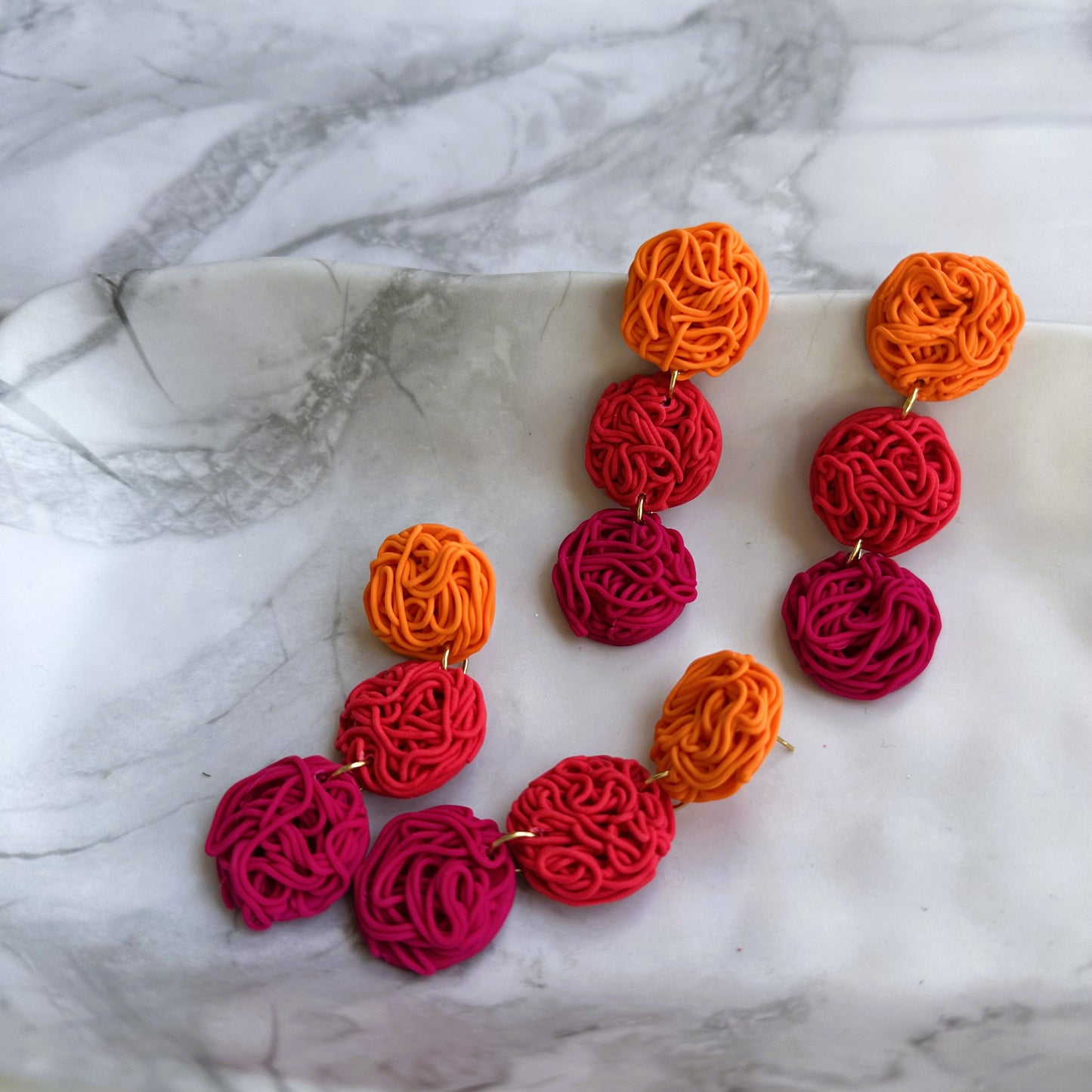 Aros Pina (rosados-naranjos)