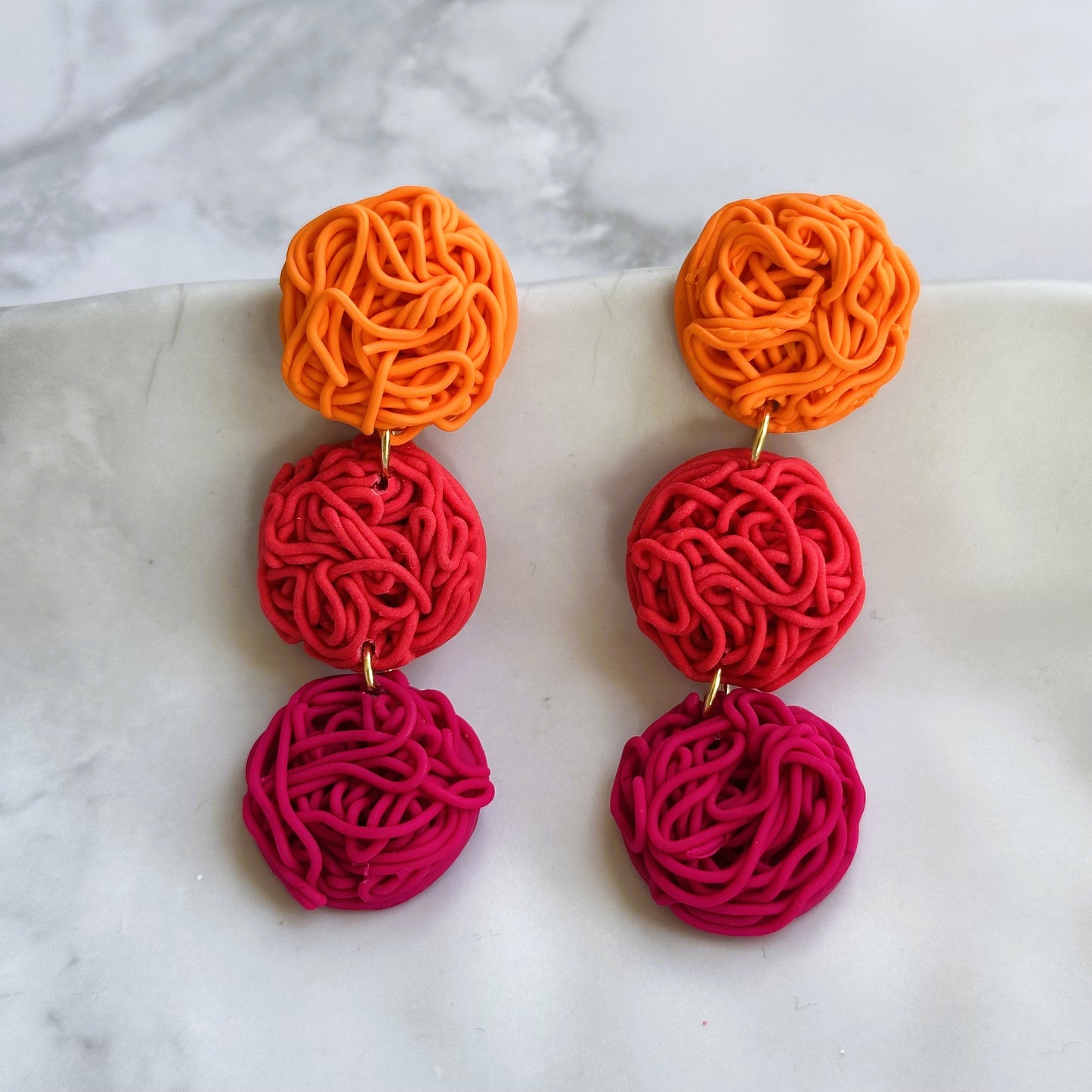 Aros Pina (rosados-naranjos)